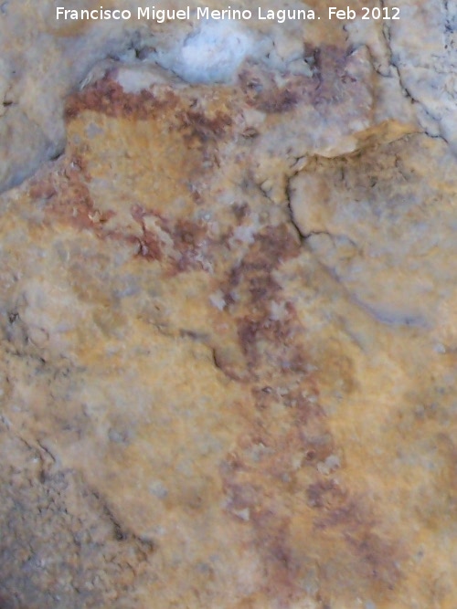 Pinturas rupestres del Abrigo del Almendro - Pinturas rupestres del Abrigo del Almendro. Antropomorfo con los brazos en phi y dos extremidades inferiores