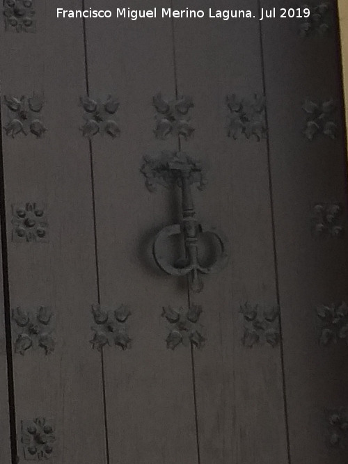 Palacio del Den Ortega - Palacio del Den Ortega. Aldaba de la puerta lateral