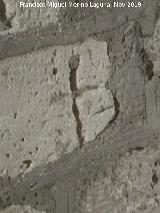 Iglesia de San Andrs. Cruz tallada en la fachada trasera