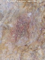 Pinturas rupestres del Abrigo del Almendro. Mancha de color rojo
