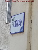 Calle Caridad. Placa