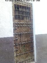 Casa de la Calle Francisco Coello n 13. Puerta de clavazn de la Calle Espiga