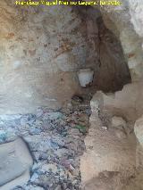 Casas Cueva del Cerro de San Marcos. Interior con pesebre