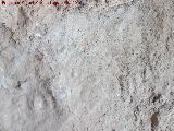 Pinturas y petroglifos rupestres de la Cueva del Encajero. Restos de petroglifos de crculos concntricos
