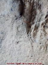Pinturas y petroglifos rupestres de la Cueva del Encajero. Restos de petroglifos