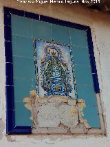 Castillo de la Aragonesa. Azulejos de la Virgen de la Cabeza en la cortijada adosada