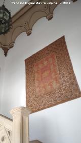 Palacio de Juan Vzquez de Molina. Tapiz con el escudo de beda en las escaleras