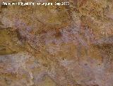 Pinturas rupestres de la Cueva del Engarbo I. Grupo II. Panel VII. Antropomorfo inferior zoomorfizado agachado en representacin de alguna danza