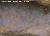 Pinturas rupestres de la Cueva del Engarbo I. Grupo II. Panel VII. Antropomorfo con los brazos en asa