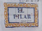 El Pilar. Placa con su nombre