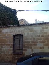 Casa del Licenciado Pedraza. Muro del patio con el Torren Albarrano del Torrico al fondo