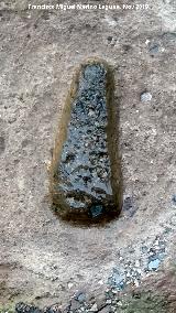 Pealosa. Molde de hacha en el banco de la casa de la terraza media