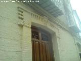 Casa de la Calle Real de San Fernando n 17. Decoracin de ladrillos y cenefas