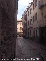 Calle Merced Alta. Palacio de los Quesada-Ulloa al fondo y la Merced a la Izquierda