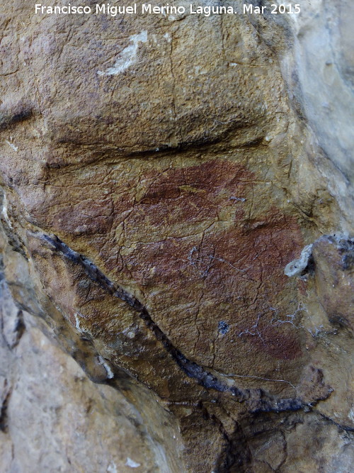 Pinturas rupestres del Abrigo de la Cantera - Pinturas rupestres del Abrigo de la Cantera. Posible antropomorfo con herramienta en su mano izquierda