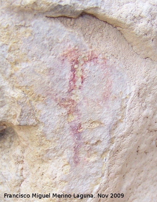 Pinturas rupestres de la Cueva de la Graja-Grupo III - Pinturas rupestres de la Cueva de la Graja-Grupo III. Antropomorfo tipo phi con una sola extremidad inferior y sin cabeza