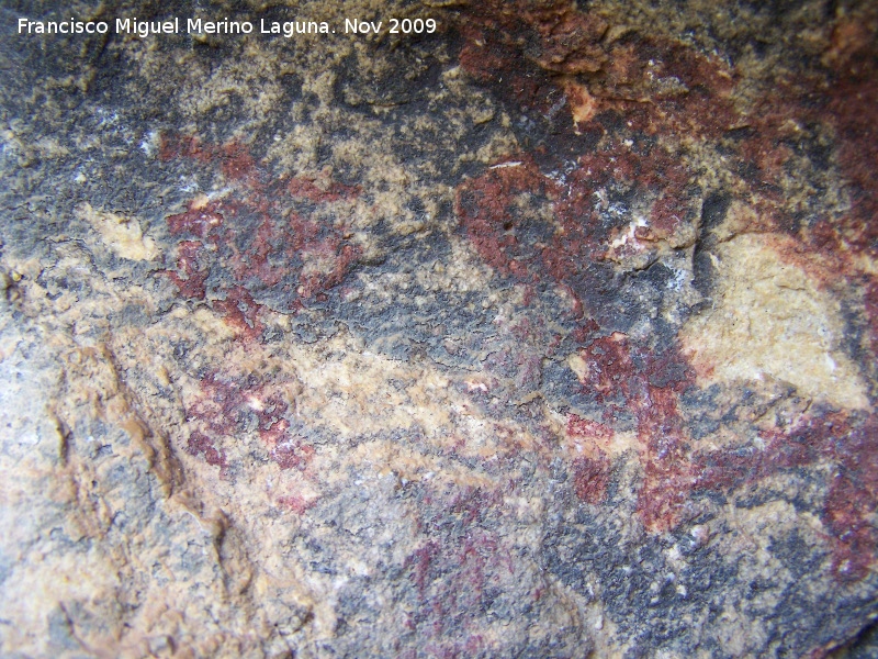 Pinturas rupestres de la Cueva de la Graja-Grupo IX - Pinturas rupestres de la Cueva de la Graja-Grupo IX. Antropomorfos, el de la izquierda con cuernos