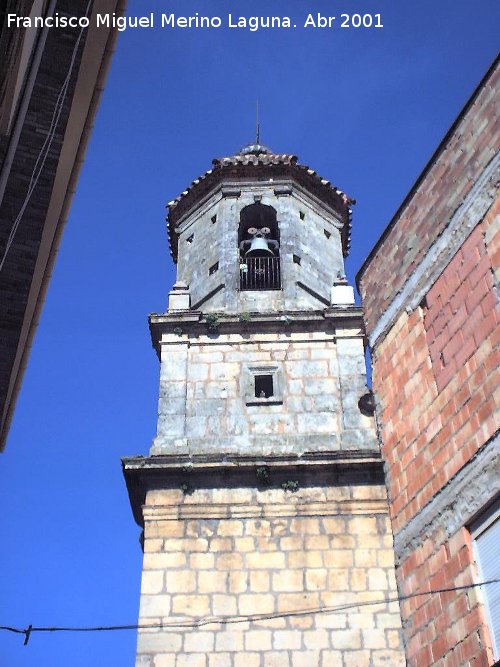 Iglesia de San Juan Bautista - Iglesia de San Juan Bautista. Torre desde la Calle Lorite