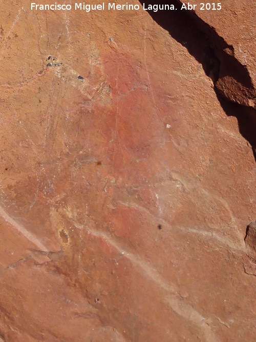 Pinturas rupestres del Abrigo de la Cueva del Santo Grupo IV - Pinturas rupestres del Abrigo de la Cueva del Santo Grupo IV. Antropomorfo sobre el que han pintado una V en blanco