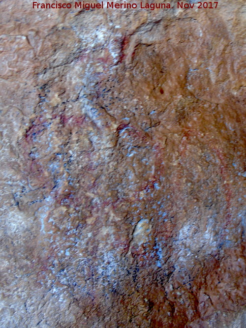 Pinturas rupestres de la Cueva de la Graja-Grupo XII - Pinturas rupestres de la Cueva de la Graja-Grupo XII. Antropomorfo inferior derecho y V invertica
