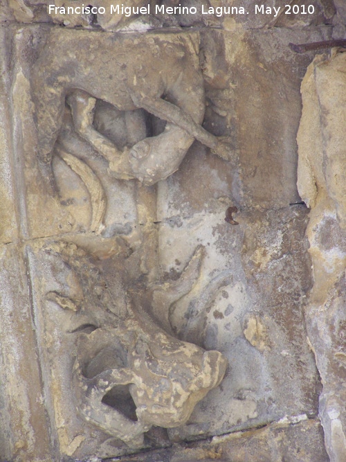 Iglesia de San Isidoro - Iglesia de San Isidoro. Detalle de la portada derecha