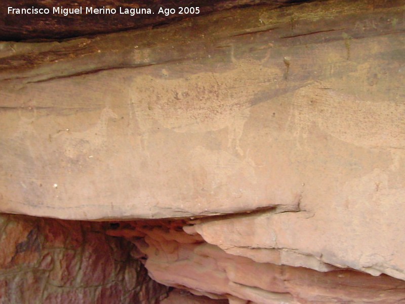 Pinturas rupestres de Los Toros del Navazo - Pinturas rupestres de Los Toros del Navazo. Parte izquierda