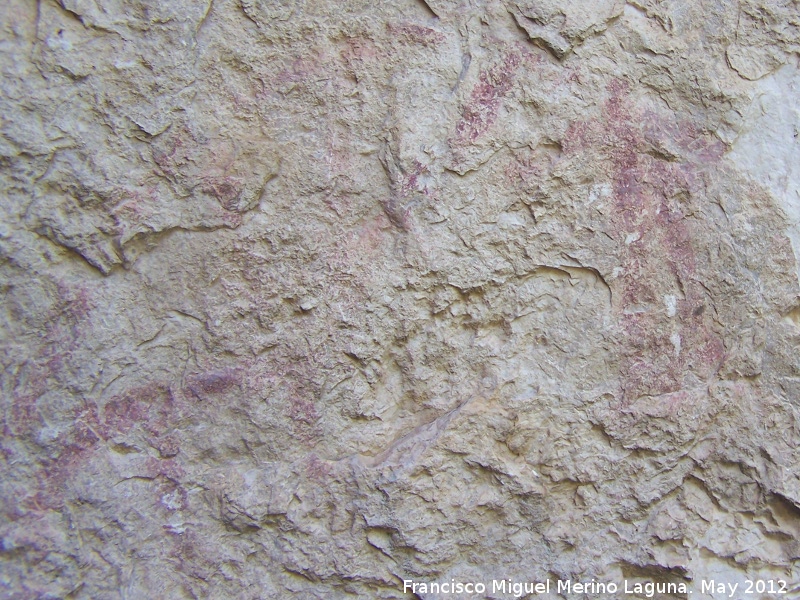 Pinturas rupestres de la Caada de la Corcuela - Pinturas rupestres de la Caada de la Corcuela. Antropomorfos bajos capturando a las cabras