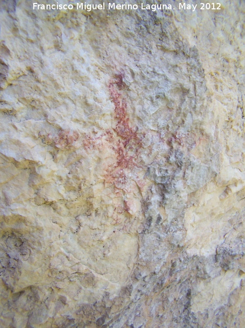 Pinturas rupestres de la Caada de la Corcuela - Pinturas rupestres de la Caada de la Corcuela. Antropomorfo en cruz de la derecha