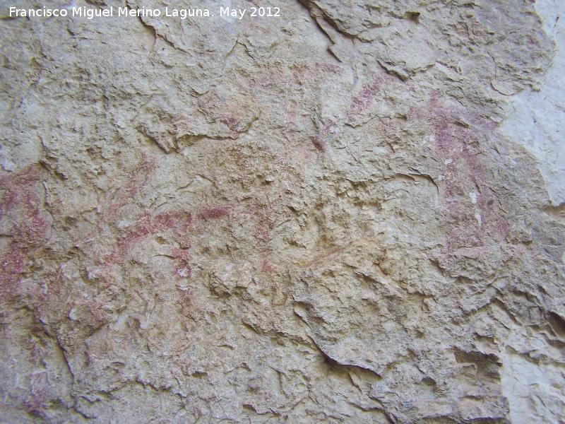 Pinturas rupestres de la Caada de la Corcuela - Pinturas rupestres de la Caada de la Corcuela. Antropomorfos bajos capturando a las cabras