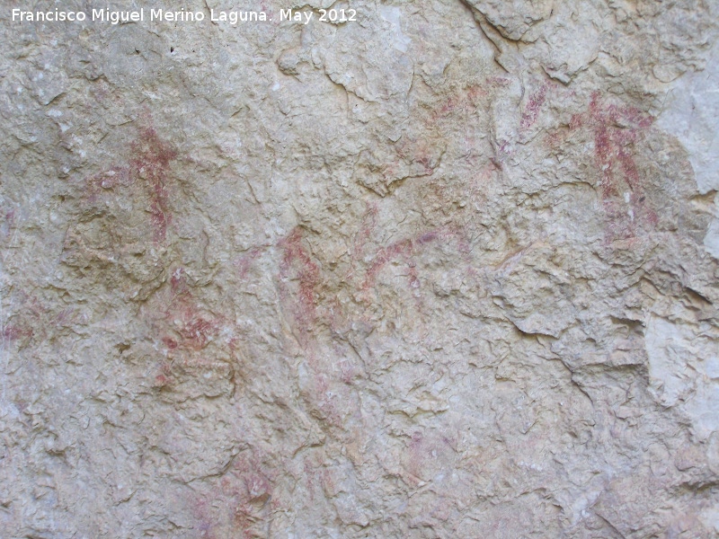Pinturas rupestres de la Caada de la Corcuela - Pinturas rupestres de la Caada de la Corcuela. Antropomorfos bajos capturando a las cabras