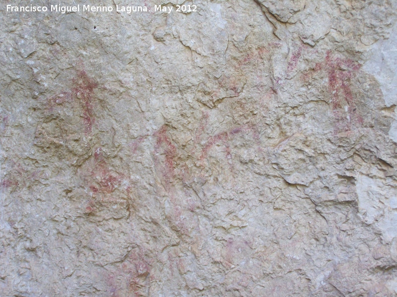 Pinturas rupestres de la Caada de la Corcuela - Pinturas rupestres de la Caada de la Corcuela. Antropomorfos bajos capturando a las cabras