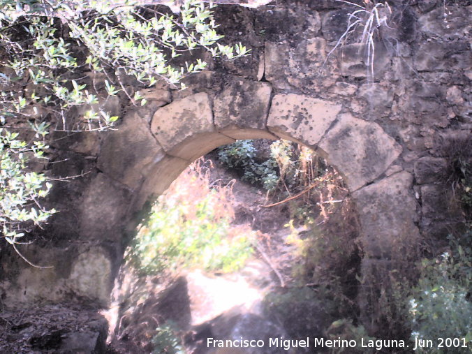 Molinillo - Molinillo. Arco de salida de aguas