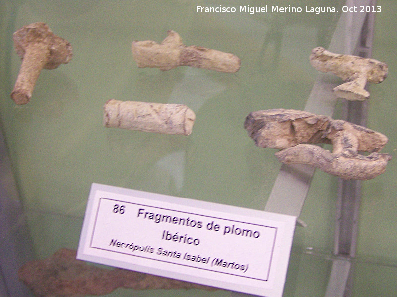 Necrpolis de Santa Isabel - Necrpolis de Santa Isabel. Plomo ibrico. Museo San Antonio de Padua - Martos