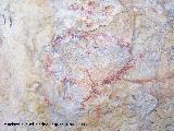 Pinturas rupestres de la Cueva de la Graja-Grupo III. Antropomorfo tipo phi con adorno en la cabeza y pene, una serie de puntos en sentido horizontal y a la altura de sus piernas estn ambos lados de la figura