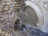 Iglesia de San Benito. Puerta cegada y acequia