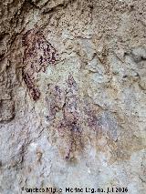 Pinturas y petroglifos rupestres de la Cueva del Encajero
