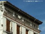 Casa de la Plaza de Espaa n 24. Alero y balaustrada