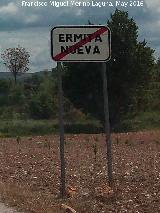 Aldea Ermita Nueva. Cartel