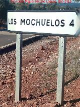 Aldea Los Mochuelos. Cartel