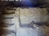 Oppidum del Cerro de la Cruz. Interior de casa ibera reconstruida