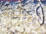 Petroglifos de Alicn de las Torres. Antropomorfo al lado de un smbolo