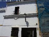 Palacio de la Calle de Sevilla n 50. Parte blanqueada de la fachada