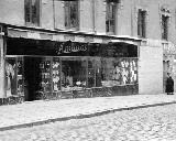 Palacio de la Diputación. Foto antigua. Perfumería, camisería y géneros de punto Amador