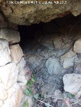 Mina de agua de El Jarillo. Interior de la mina colmatada de tierra y piedras