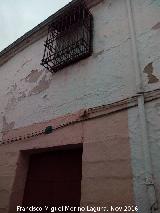 Casa de la Calle San Juan de la Cruz n° 7. Reja y portada