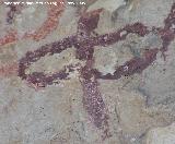 Pinturas rupestres de la Cueva de la Graja-Grupo VIII. Antropomorfo tipo phi con una sola pierna y de color rojo obscuro