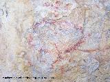 Pinturas rupestres de la Cueva de la Graja-Grupo III. Antropomorfo tipo phi con adorno en la cabeza y pene, una serie de puntos en sentido horizontal y a la altura de sus piernas estn ambos lados de la figura