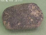 Castro de la Magdalena. Piedra de mano de molino prehistrico. Museo Colegio San Antonio de Padua - Martos