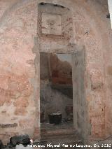 Iglesia de San Juan Bautista. Puerta y arco encontrados tras las escaleras del coro