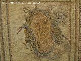 Villa Romana de Bruñel. Mosaico romano, busto de Thetis con patas de cangrejo en la cabeza y serpiente en el cuello. Museo Provincial de Jaén